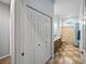 Bathroom featuring wood cabinets, shower-tub combination, and beige tile at 30017 Johnston Rd, Dade City, FL 33523