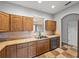 Kitchen featuring stainless steel appliances, tile floors, and a sink with a window at 30017 Johnston Rd, Dade City, FL 33523