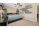 A cozy bedroom with a dark wooden bedframe and shelves filled with Funko Pops at 3530 Brook Crossing Dr, Brandon, FL 33511