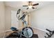 Carpeted room with ceiling fan and a elliptical trainer for a great workout from home at 3530 Brook Crossing Dr, Brandon, FL 33511