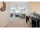 Inviting living room boasts neutral tones, plush carpet, and a cozy seating arrangement for relaxation at 3530 Brook Crossing Dr, Brandon, FL 33511