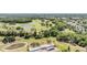 Beautiful aerial view of the lush golf course, ponds, and surrounding natural landscape at 3839 Trophy Blvd # 3839, New Port Richey, FL 34655