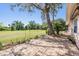 Back patio with a view of the well maintained backyard, perfect for relaxing or entertaining at 3839 Trophy Blvd # 3839, New Port Richey, FL 34655