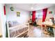 This bedroom has a ceiling fan and can be utilized as an office or workout space at 3850 13 N Ave # 113, St Petersburg, FL 33713