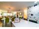 Kitchen view including island, dining area, and living spaces with natural light at 3850 13 N Ave # 113, St Petersburg, FL 33713