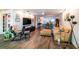 Open living room showcasing contemporary decor, wood-look flooring, and stylish furnishings at 3850 13 N Ave # 113, St Petersburg, FL 33713