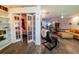 Cozy living room featuring built-in shelves, french doors, and open layout, and stylish furnishings at 3850 13 N Ave # 113, St Petersburg, FL 33713