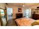 This main bedroom boasts a ceiling fan, stylish decor, and hardwood floors at 3850 13 N Ave # 113, St Petersburg, FL 33713
