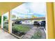 Covered parking area with multiple cars parked under a shaded structure at 3850 13 N Ave # 113, St Petersburg, FL 33713