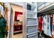 This walk-in closet features built-in shelving and a view of the bathroom at 3850 13 N Ave # 113, St Petersburg, FL 33713