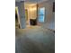 Bedroom featuring a bathroom vanity, walk-in closet, and a view of the backyard through a window at 3902 Shoreside Cir, Tampa, FL 33624
