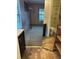 Bedroom leading to the bathroom with a shower and vanity, offering a convenient and private space at 3902 Shoreside Cir, Tampa, FL 33624