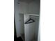 Interior shot of a simple closet with minimalist design and storage at 3902 Shoreside Cir, Tampa, FL 33624