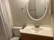 Cozy bathroom with a sink, toilet, and shower-tub combo at 4008 Ashford Green Pl # F101, Tampa, FL 33613