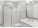 Modern bathroom with tiled shower, subway tiles, and white vanity at 4325 Barletta Ct, Wesley Chapel, FL 33543