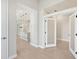 The open foyer offers an inviting view into the modern kitchen and dining area at 4325 Barletta Ct, Wesley Chapel, FL 33543