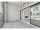 Covered lanai provides an outdoor living space with views of the house's interior and backyard at 4325 Barletta Ct, Wesley Chapel, FL 33543