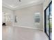 Bright and open living space with access to the outdoor patio at 4325 Barletta Ct, Wesley Chapel, FL 33543