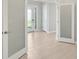 Bright office space with frosted glass doors and light tile flooring at 4325 Barletta Ct, Wesley Chapel, FL 33543