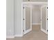 Bright office space with frosted glass doors and light tile flooring at 4325 Barletta Ct, Wesley Chapel, FL 33543