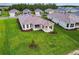 Aerial view of a home with manicured lawn and stylish architecture at 4709 Isonzo Way, Wesley Chapel, FL 33543