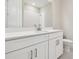 Bathroom featuring a white vanity, a gray countertop and brushed nickel hardware at 4709 Isonzo Way, Wesley Chapel, FL 33543