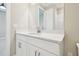 Bathroom with white cabinets, quartz countertops, shower with white subway tile at 4709 Isonzo Way, Wesley Chapel, FL 33543