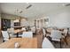 Community dining room offers seating at tables and a billiards table at 4709 Isonzo Way, Wesley Chapel, FL 33543