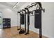 Workout room includes heavy bag station with three punching bags at 4709 Isonzo Way, Wesley Chapel, FL 33543