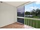 Screened-in patio with a view of the pool at 4801 Airport Rd # 210, Zephyrhills, FL 33542