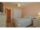 Comfortable bedroom with a double bed, light colored walls, and white trim at 4821 Grand Banks Dr, Wimauma, FL 33598