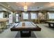 Billiards room featuring pool tables, comfortable lighting, and recreational amenities at 4821 Grand Banks Dr, Wimauma, FL 33598