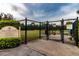 Enclosed dog park featuring secure fencing, green space, and play areas for pets and owners at 4821 Grand Banks Dr, Wimauma, FL 33598