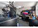 Home office with multiple monitors and professional equipment, ideal for remote work or creative projects at 5305 Lenoir Ct, Plant City, FL 33566
