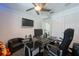 Functional office space with desk, storage, and media at 5305 Lenoir Ct, Plant City, FL 33566