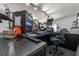 Well-equipped studio featuring multiple monitors, mixing equipment, and a comfortable workspace for efficient production at 5305 Lenoir Ct, Plant City, FL 33566