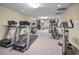 Well-equipped gym featuring treadmills, elliptical machines, and weights for a complete workout at 5480 Orange Blossom N Rd, Pinellas Park, FL 33782