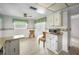 Kitchen eating area with bright decor and chairs at 5480 Orange Blossom N Rd, Pinellas Park, FL 33782