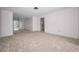 Bright living room with access to the backyard and bathroom at 5480 Orange Blossom N Rd, Pinellas Park, FL 33782