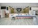 Large meeting room with a stage, tables, and patriotic decorations, perfect for gatherings at 5480 Orange Blossom N Rd, Pinellas Park, FL 33782