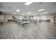 Spacious meeting room with tables, chairs, and bright lighting, ideal for community events at 5480 Orange Blossom N Rd, Pinellas Park, FL 33782