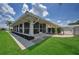 Relaxing screened-in patio, ideal for enjoying the outdoors in comfort at 5480 Orange Blossom N Rd, Pinellas Park, FL 33782