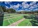 Outdoor shuffleboard courts in a community setting, perfect for recreation and leisure at 5480 Orange Blossom N Rd, Pinellas Park, FL 33782