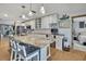 Spacious kitchen with a large island, white cabinets, and modern appliances, perfect for cooking at 550 George S St, Tarpon Springs, FL 34688
