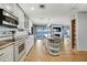 Stylish kitchen featuring an island, modern appliances, and open access to the living area with a beautiful view at 550 George S St, Tarpon Springs, FL 34688