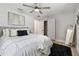 Comfortable bedroom with ceiling fan, closet, ample natural light and neutral decor at 5624 62Nd N St, St Petersburg, FL 33709