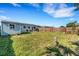 Expansive backyard with shed and a well-maintained lawn, perfect for outdoor enjoyment and entertainment at 5711 9Th N Ave, St Petersburg, FL 33710