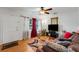 Inviting living room with hardwood floors, a large window, and comfortable seating at 5711 9Th N Ave, St Petersburg, FL 33710