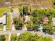 Aerial view highlighting property lines and the home's location near a road, showcasing the area at 577 Waterfall Dr, Spring Hill, FL 34608