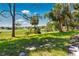Spacious backyard with a lush lawn and picturesque views of the surrounding landscape at 577 Waterfall Dr, Spring Hill, FL 34608